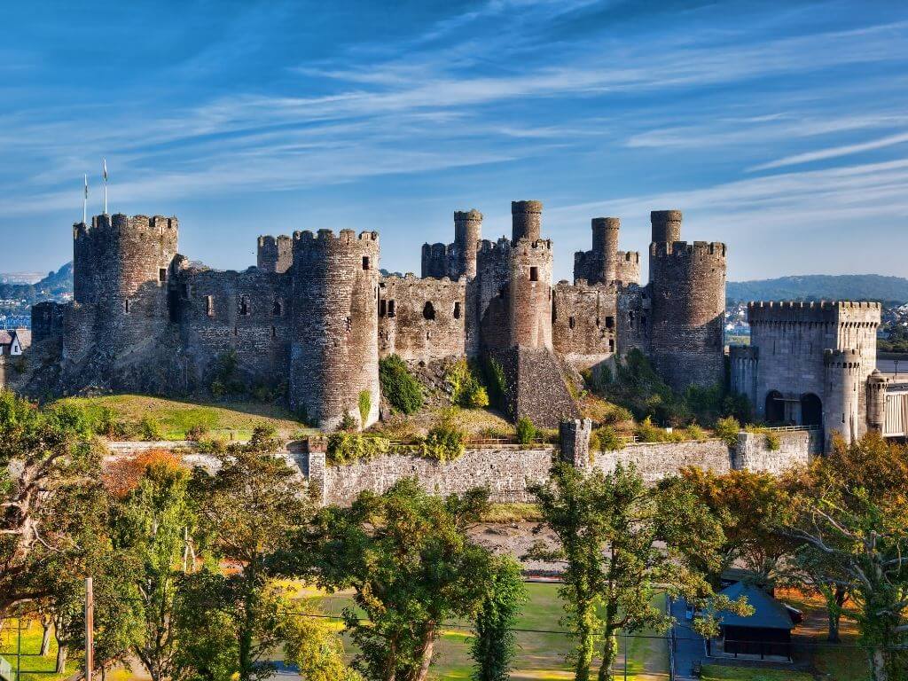 A picture of Conwy Castle with blue skies overhead