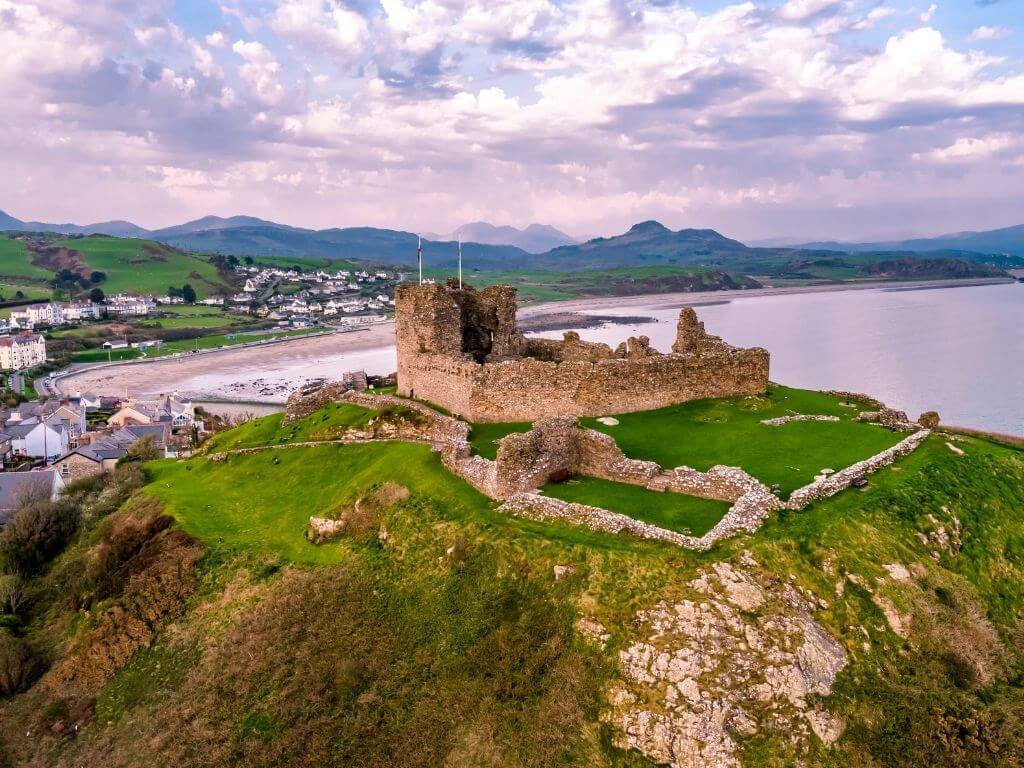 A picture of Criccieth Castle in Snowdonia with the inlet in the background