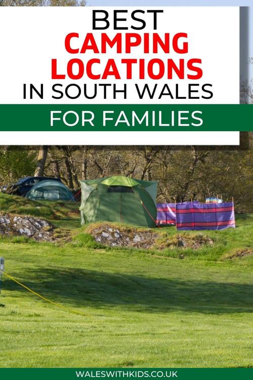 A group of tents pitched near trees on a gently sloping hill with text overlay saying best camping locations in South Wales for families