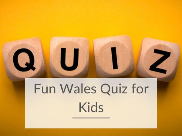 A picture of wooden letter cubes spelling the word quiz on a yellow background and with a white text box with words saying fun wales quiz for kids